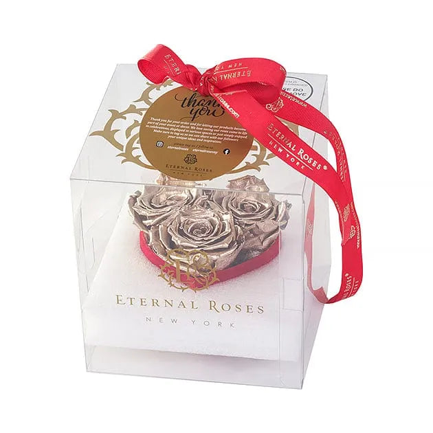 Eternal Roses® Gold Roses containing heart shaped gift box is an ultimate romantic gift